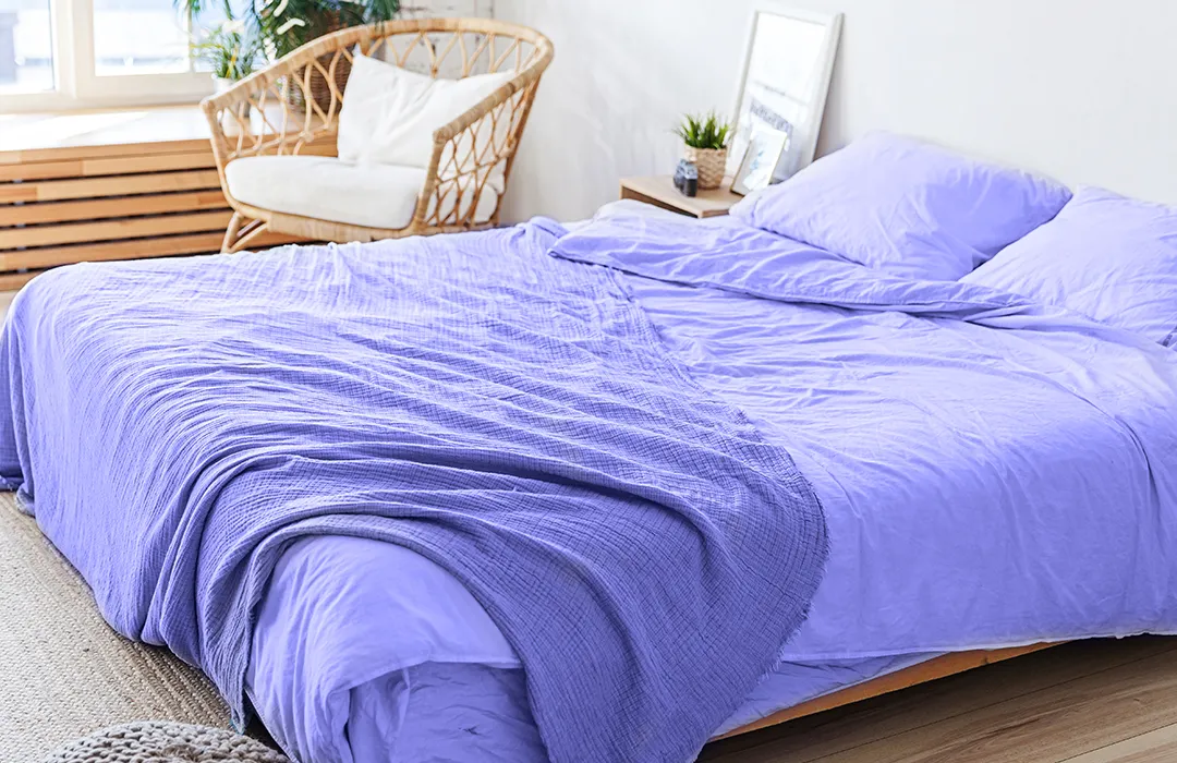 Very Peri bedroom and Very Peri bedding and pillows