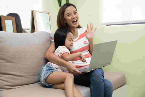 Mother and Child Checking Lumina Homes Online
