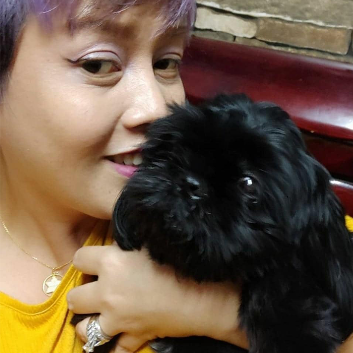 Spending time with pets is a fun hobby for blogger Adae Ang.